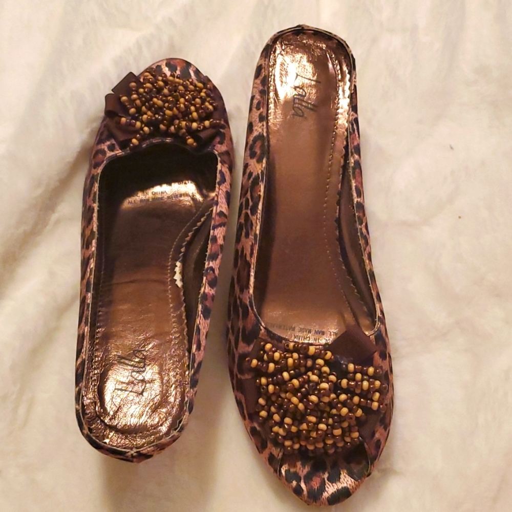 Animal print open toe heals.